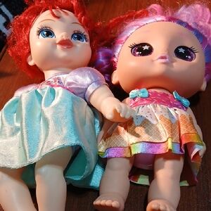 Adorable Doll Duo with Red and Pink Hair